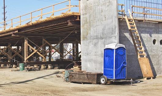 construction site portable restrooms ready for use